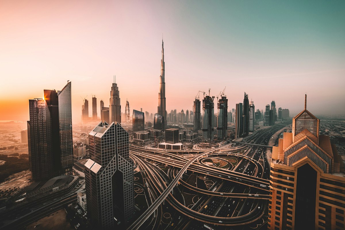 Dubai skyline and highways at dusk